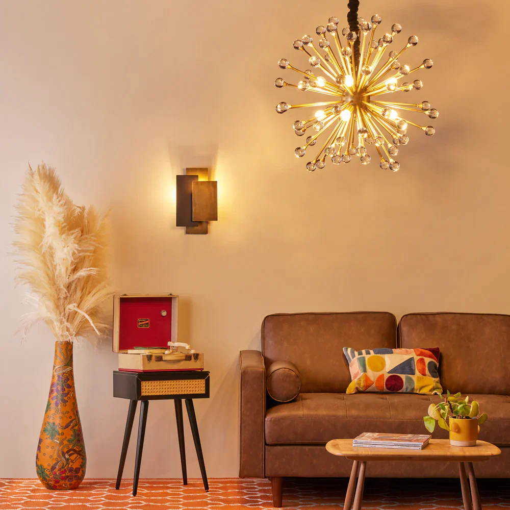 Layered lighting room decor idea using table lamps, floor lamps, and warm lights