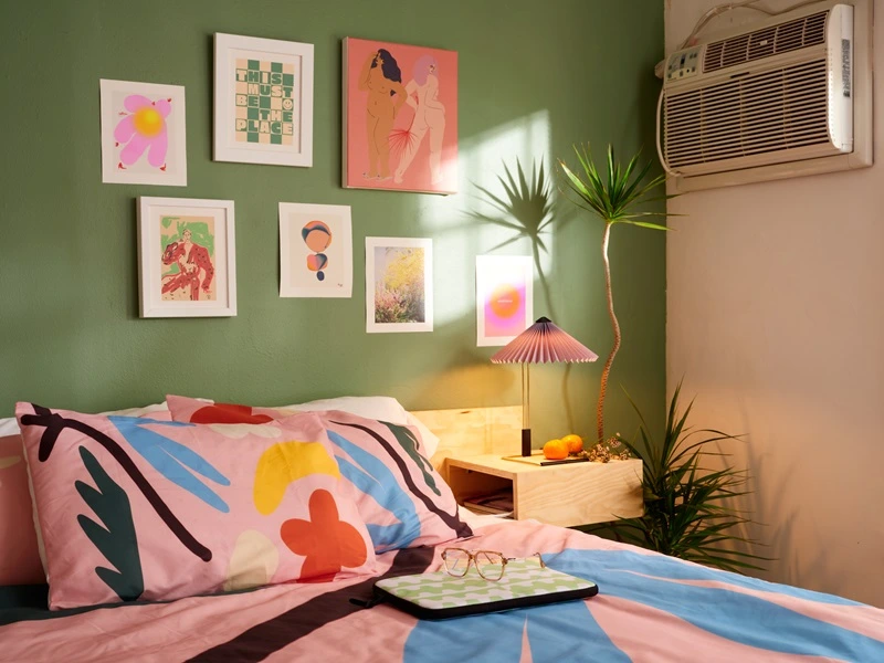 Personal wall art room decor idea with framed artwork and photos